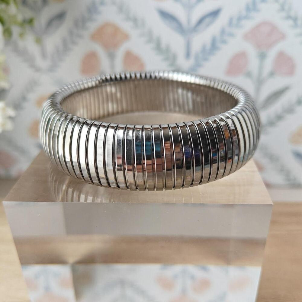 Silver tone wide ribbed omega bangle bracelet